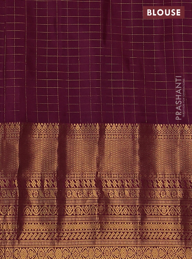 Pure gadwal silk saree light blue and wine shade with allover zari checks & buttas and long zari woven border