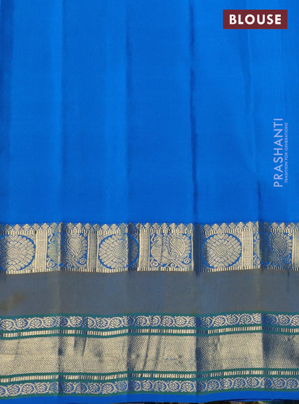 Pure gadwal silk saree wine shade and cs blue with allover zari weaves & buttas and temple design rettapet zari woven border