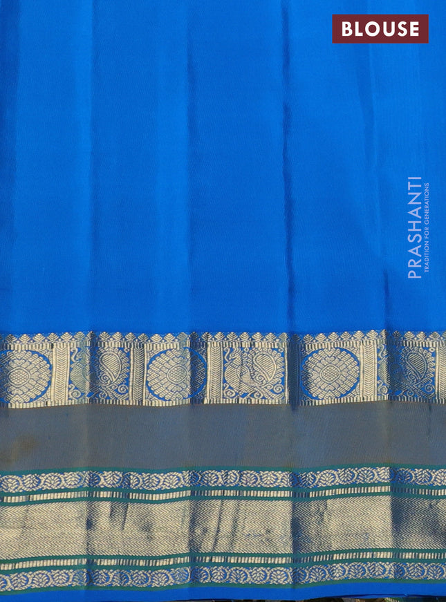 Pure gadwal silk saree wine shade and cs blue with allover zari weaves & buttas and temple design rettapet zari woven border
