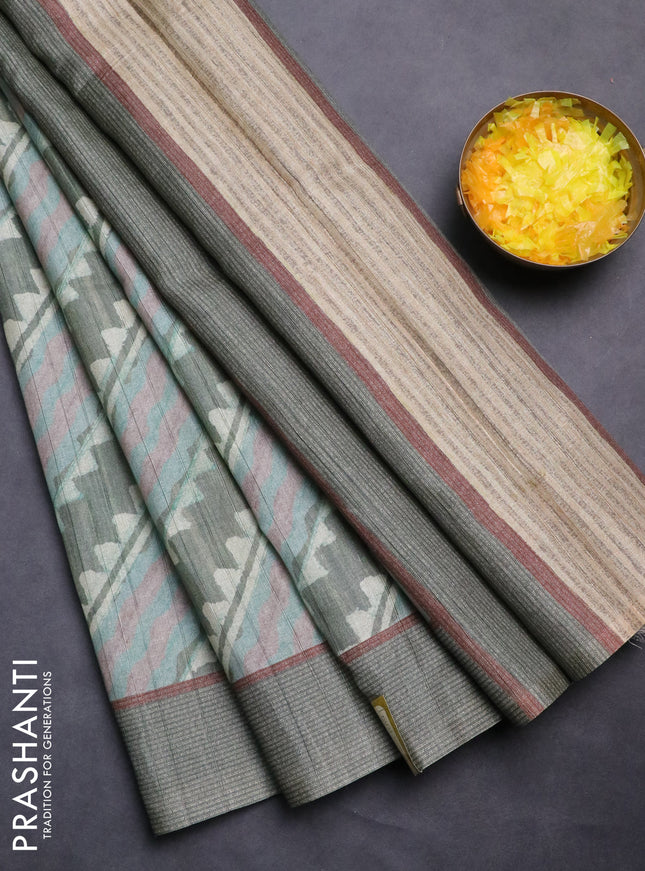 Semi tussar saree pastel green with allover prints and simple border