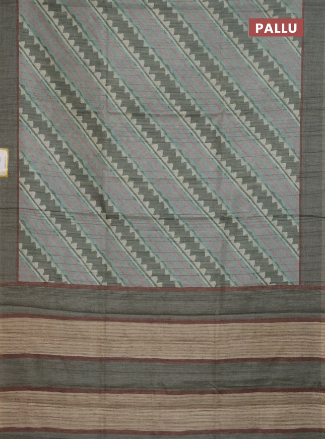 Semi tussar saree pastel green with allover prints and simple border