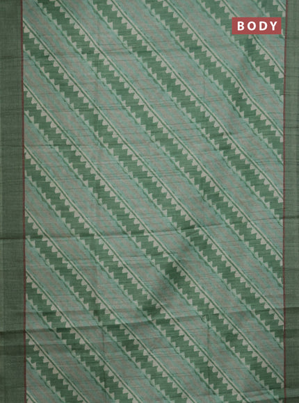 Semi tussar saree green with allover prints and simple border