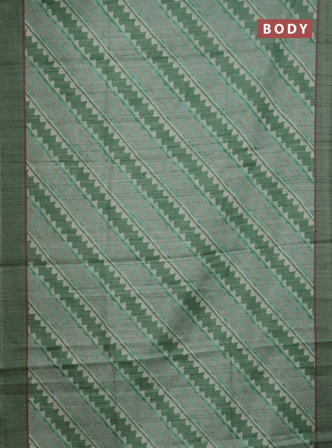 Semi tussar saree green with allover prints and simple border