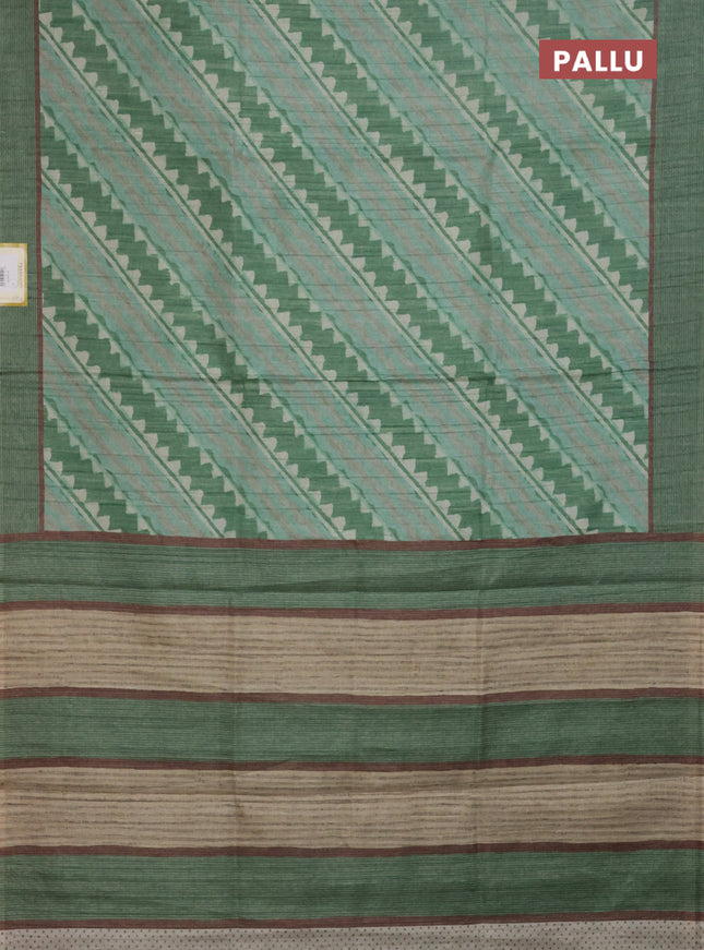 Semi tussar saree green with allover prints and simple border