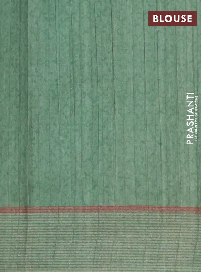 Semi tussar saree green with allover prints and simple border