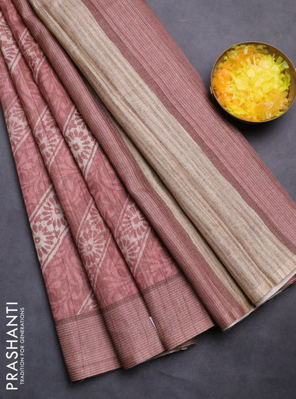 Semi tussar saree rust shade with allover prints and simple border