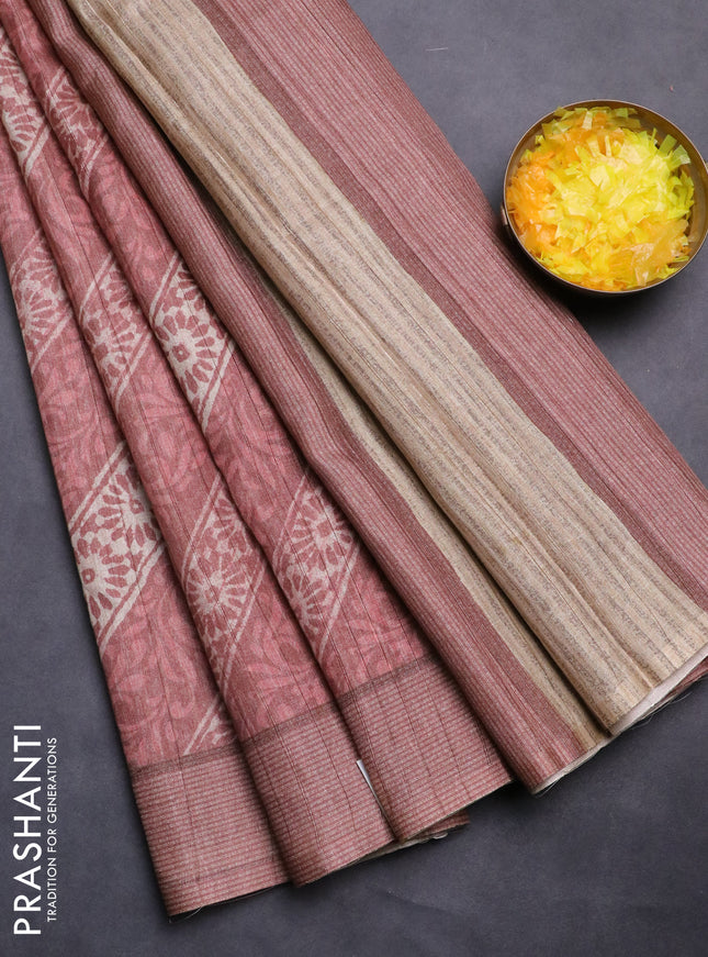 Semi tussar saree rust shade with allover prints and simple border
