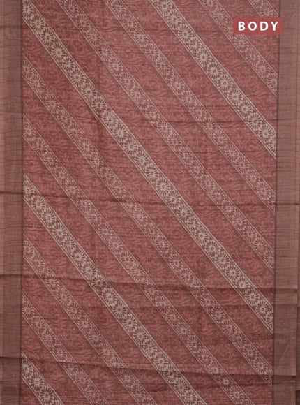 Semi tussar saree rust shade with allover prints and simple border