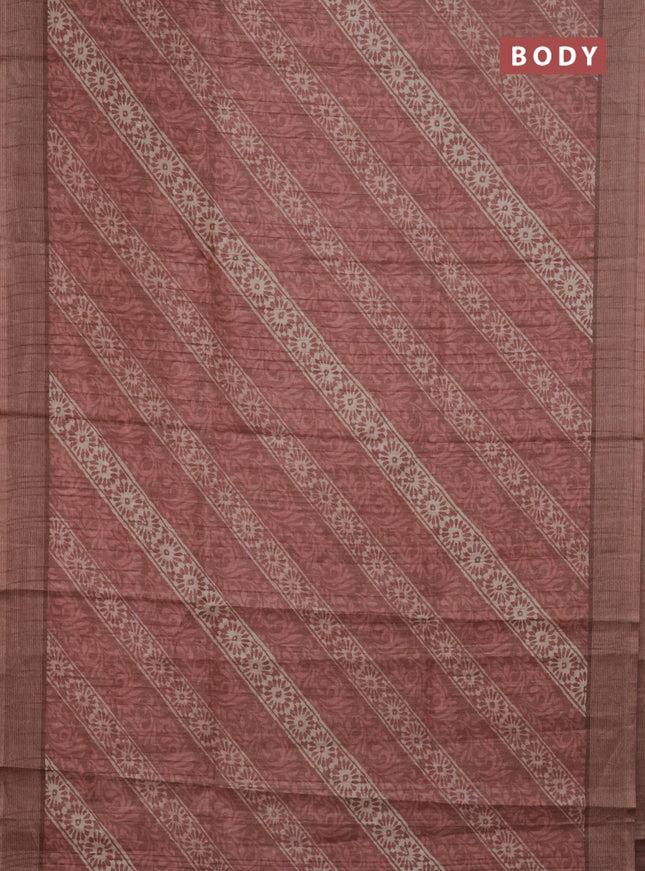 Semi tussar saree rust shade with allover prints and simple border