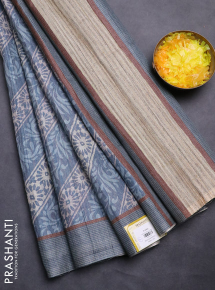 Semi tussar saree pastel blue with allover prints and simple border