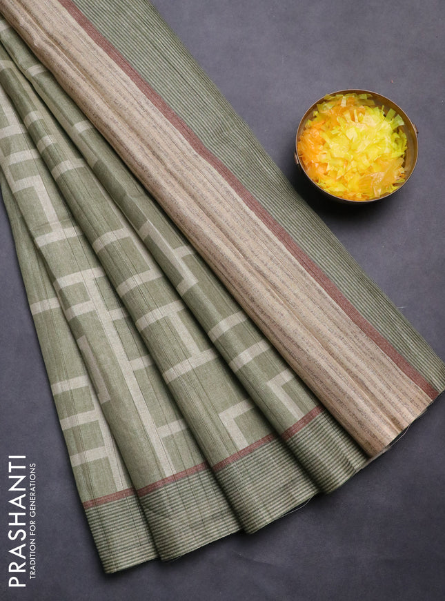 Semi tussar saree pastel green with geometric prints and simple border
