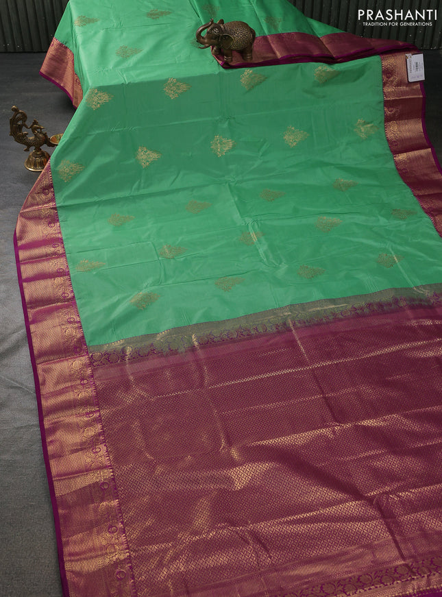 Bangalori silk saree teal green shade and magenta pink with zari woven buttas and zari woven border