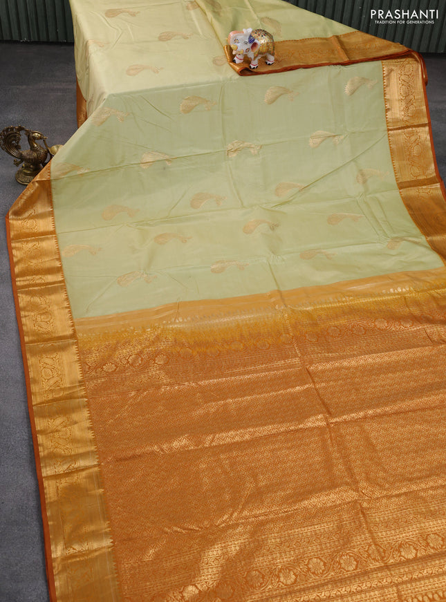 Bangalori silk saree pista green and dark mustard with zari woven buttas and zari woven border