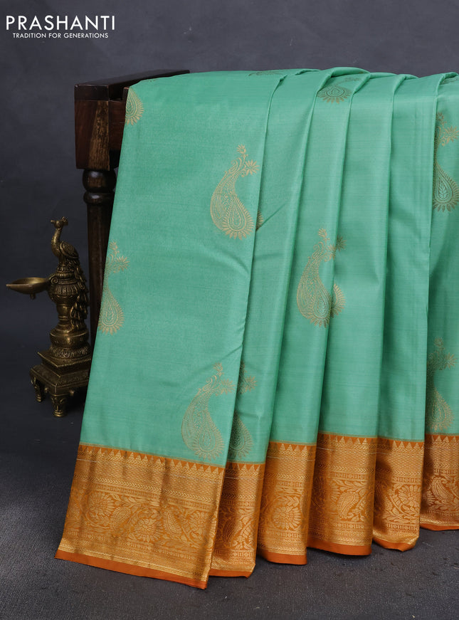 Bangalori silk saree pastel green and dark mustard with zari woven buttas and zari woven border