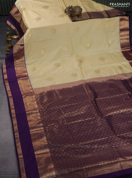 Bangalori silk saree pale yellow and violet with zari woven buttas and rettapet zari woven border