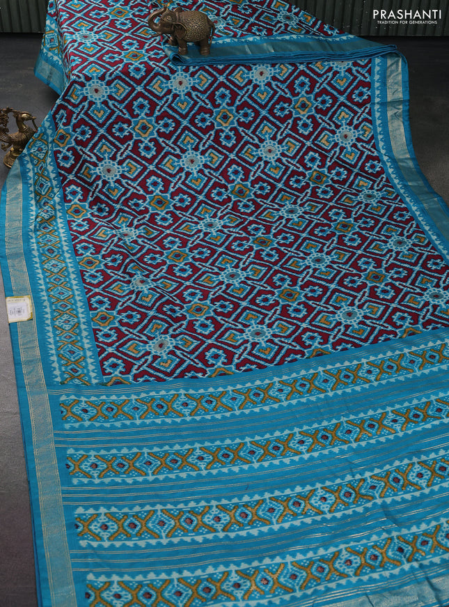 Semi pochampally silk saree teal blue with allover ikat weaves and zari woven border