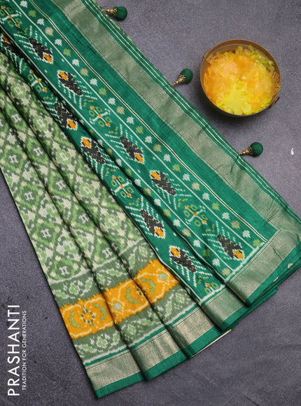 Semi pochampally silk saree green shade and yellow with allover ikat weaves and zari woven border
