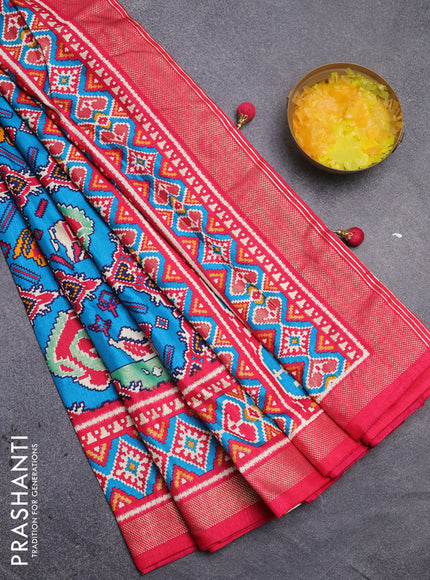 Semi pochampally silk saree teal blue and pink with patola prints and zari woven border
