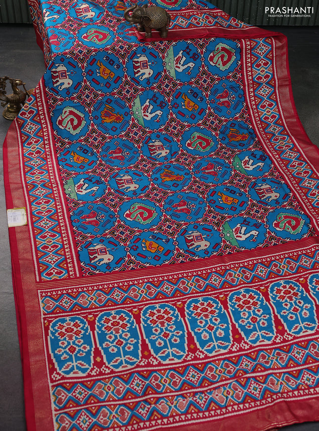 Semi pochampally silk saree teal blue and pink with patola prints and zari woven border