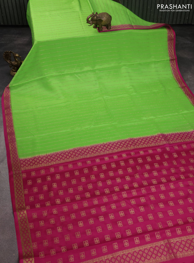 Pure mysore silk saree fluorescent green and pink with allover zari weaves and zari woven border