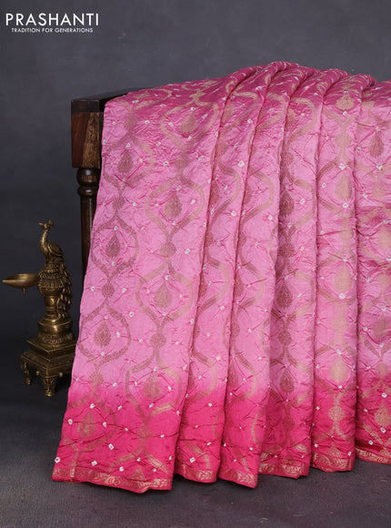 Chiniya silk saree pastel pink and pink with allover bandhani prints & zari weaves and zari woven border