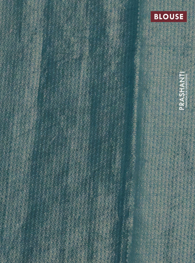 Chiniya silk saree teal blue with allover bandhani prints & zari weaves and zari woven border