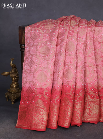 Chiniya silk saree peach pink and red shade with allover bandhani prints & zari weaves and zari woven border