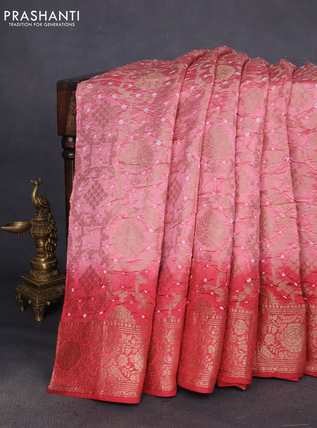 Chiniya silk saree peach pink and red shade with allover bandhani prints & zari weaves and zari woven border