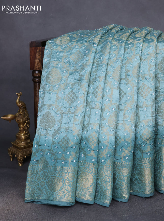 Chiniya silk saree pastel blue and pastel green shade with allover bandhani prints & zari weaves and zari woven border