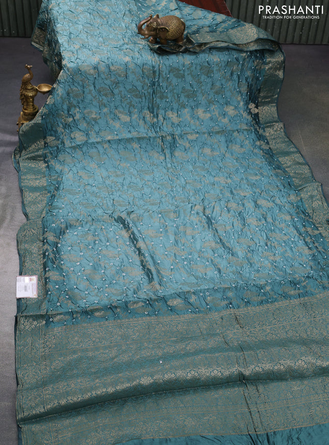 Chiniya silk saree pastel green shade with allover bandhani prints & zari weaves and zari woven border
