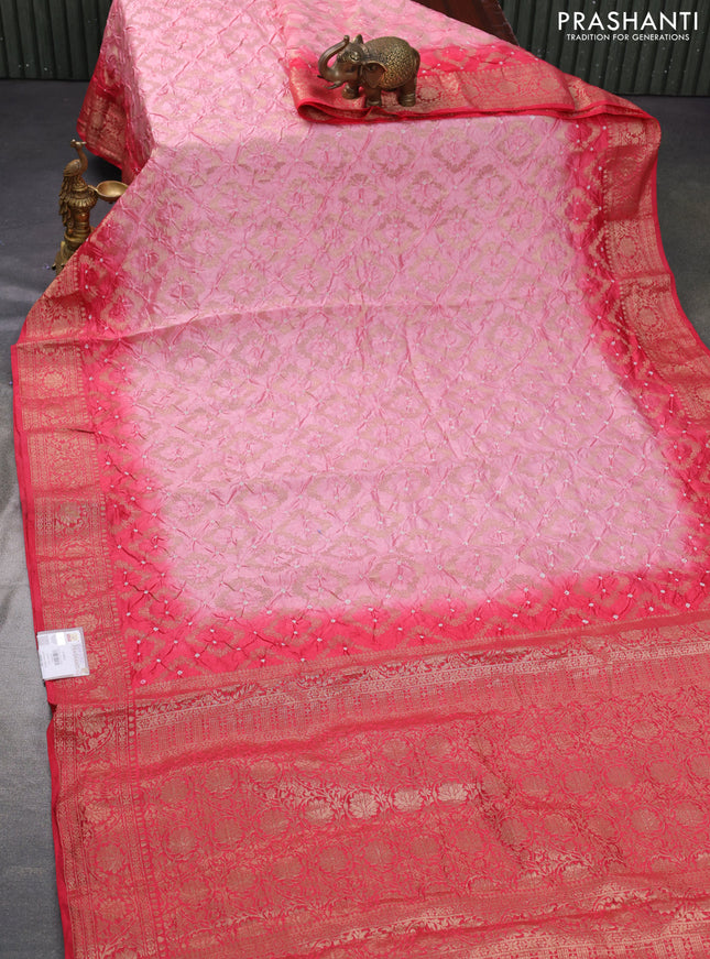 Chiniya silk saree peach shade and red shade with allover bandhani prints & zari weaves and zari woven border