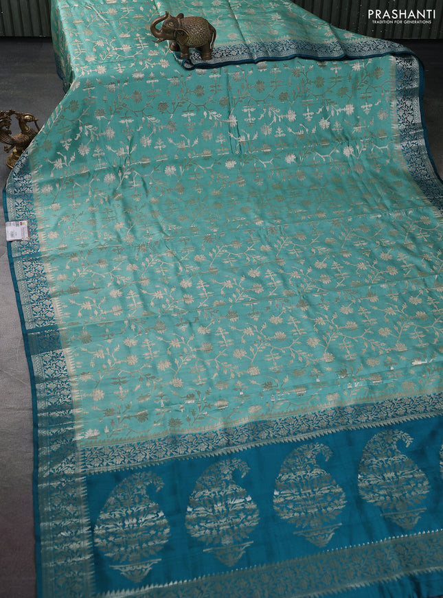Chiniya silk saree pastel green and peacock green with allover zari weaves and zari woven border