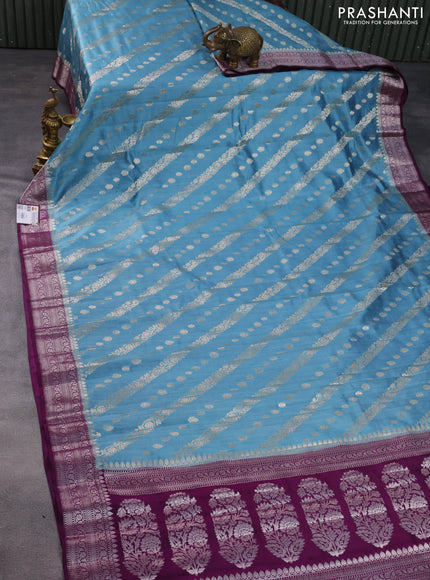 Chiniya silk saree pastel blue and wine shade with allover zari weaves and zari woven border