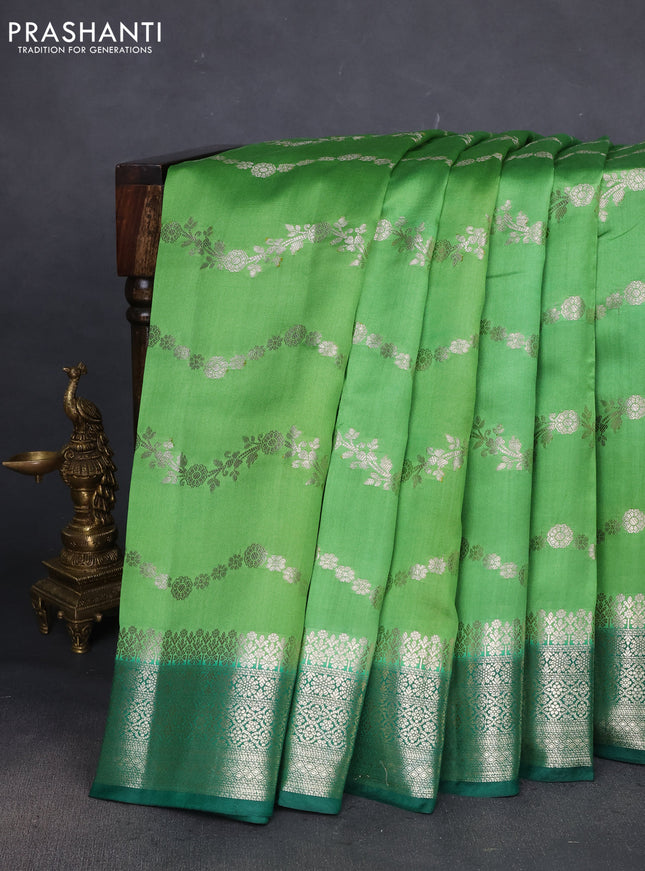 Chiniya silk saree light green and dark green with allover zari weaves and zari woven border