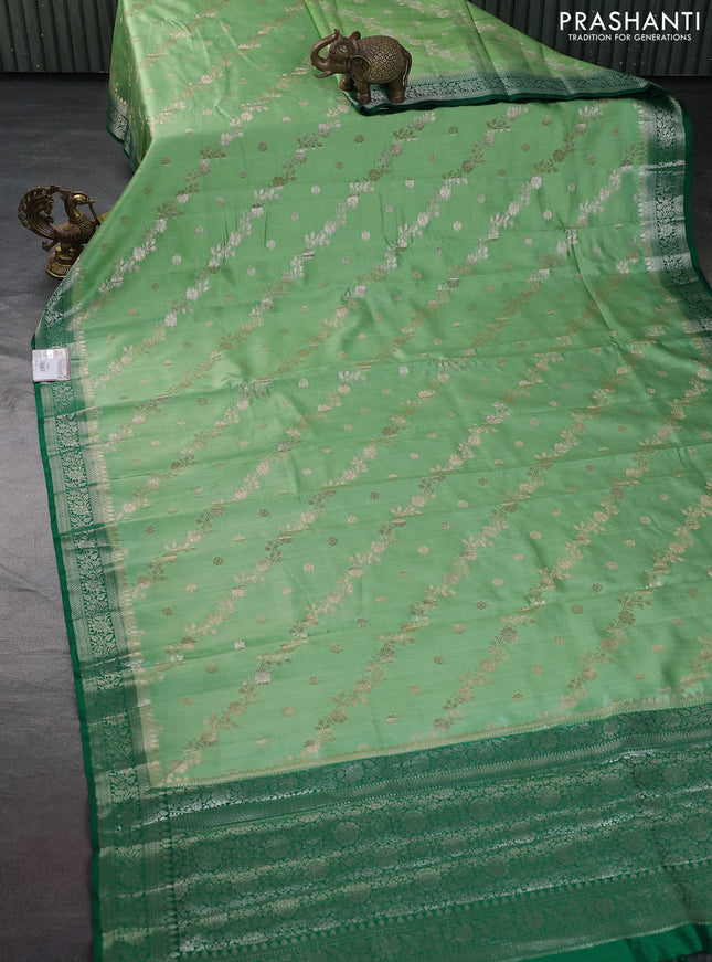 Chiniya silk saree light green and dark green with allover zari weaves and zari woven border