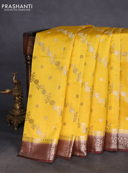 Chiniya silk saree yellow and coffee brown with allover zari weaves and zari woven border