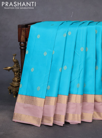 Pure kanchipuram silk saree teal blue and sandal with zari woven buttas and rettapet zari woven border
