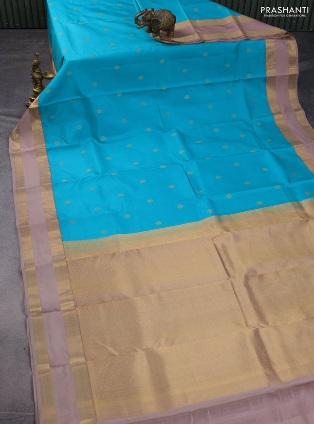 Pure kanchipuram silk saree teal blue and sandal with zari woven buttas and rettapet zari woven border