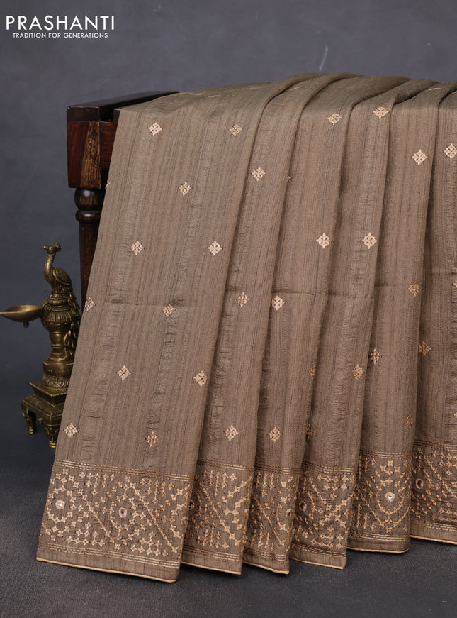 Semi tussar saree chikku shade and sandal with embroidery work buttas and embroidery mirror work border