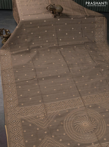 Semi tussar saree chikku shade and sandal with embroidery work buttas and embroidery mirror work border