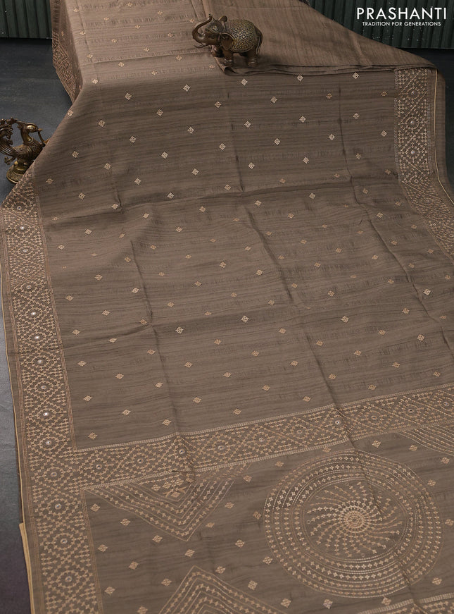 Semi tussar saree chikku shade and sandal with embroidery work buttas and embroidery mirror work border