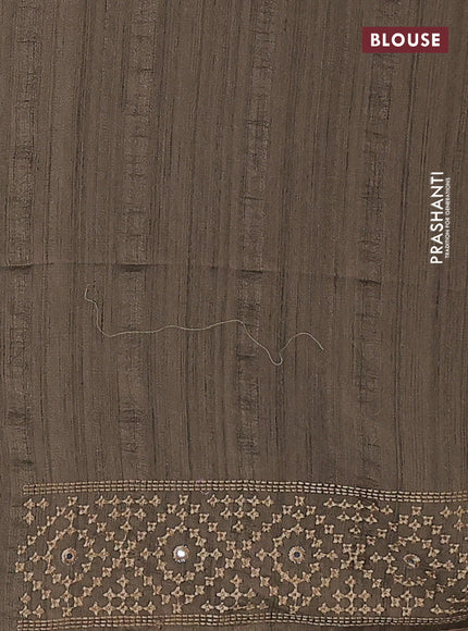 Semi tussar saree chikku shade and sandal with embroidery work buttas and embroidery mirror work border