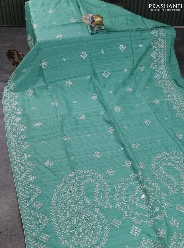 Semi tussar saree teal green and cream with embroidery work buttas and embroidery mirror work border
