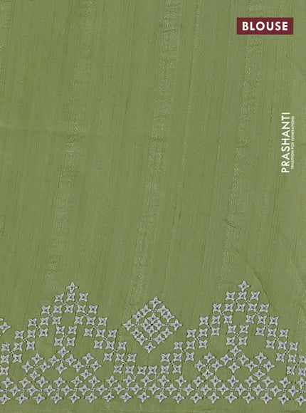 Semi tussar saree pista green and cream with embroidery work buttas and embroidery mirror work border