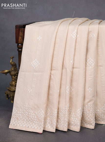 Semi tussar saree cream with embroidery work buttas and embroidery mirror work border