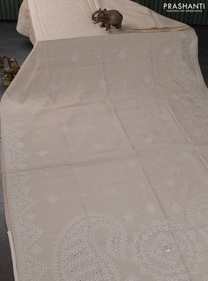 Semi tussar saree cream with embroidery work buttas and embroidery mirror work border