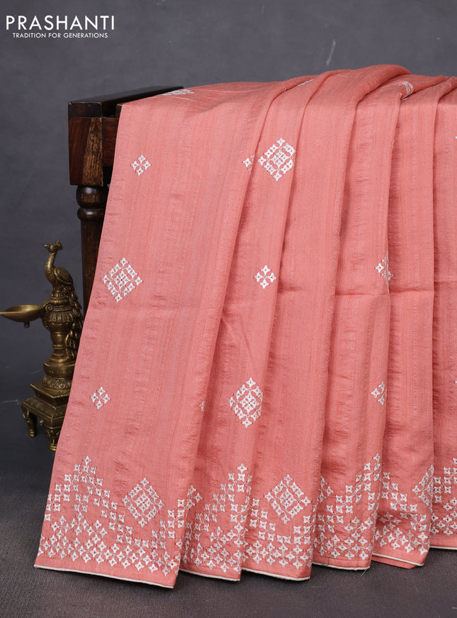 Semi tussar saree peach shade and cream with embroidery work buttas and embroidery mirror work border