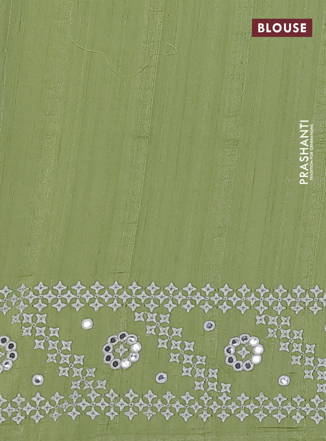 Semi tussar saree pista green and cream with embroidery work buttas and embroidery mirror work border