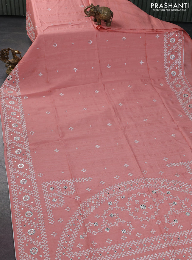 Semi tussar saree peach shade and cream with embroidery work buttas and embroidery mirror work border