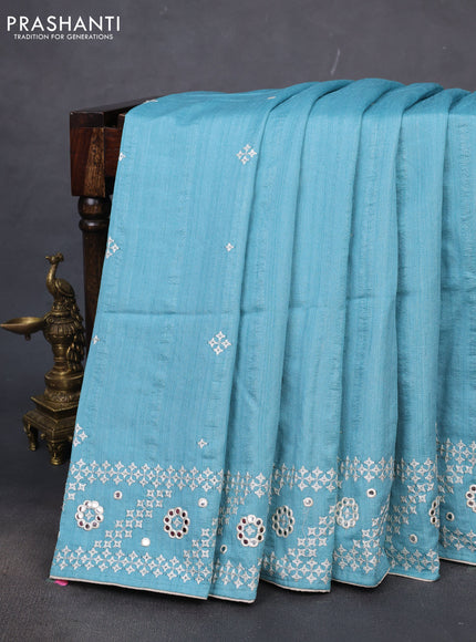 Semi tussar saree teal blue and cream with embroidery work buttas and embroidery mirror work border